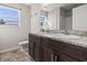 Bright bathroom features double sink vanity with granite countertop and tile flooring at 1801 Heirloom Dr., Conway, SC 29527