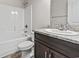 Bathroom features a vanity with a granite countertop, shower, and toilet at 1801 Heirloom Dr., Conway, SC 29527