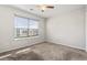 Bedroom featuring carpet flooring, a large window, and a ceiling fan at 1801 Heirloom Dr., Conway, SC 29527