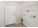 Laundry room with a washer and dryer hookups, a wire shelf, and vinyl flooring at 1801 Heirloom Dr., Conway, SC 29527