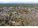 Aerial view of the community highlighting the property's location amidst lush greenery at 182 Minnow Dr., Pawleys Island, SC 29585