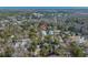 Aerial view of the community showing the property's location amidst lush greenery and roads at 182 Minnow Dr., Pawleys Island, SC 29585