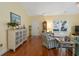 Living room with hardwood floors, ample natural light, and a charming decor style at 182 Minnow Dr., Pawleys Island, SC 29585