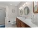 Bathroom featuring double sinks, a large soaking tub, and a separate shower at 199 Glenwood Dr., Conway, SC 29526