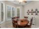 Bright dining area with natural light, a wooden table, and ample seating for Gathering gatherings at 199 Glenwood Dr., Conway, SC 29526