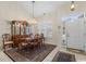 Dining room with a chandelier, plantation shutters, and access to the kitchen at 199 Glenwood Dr., Conway, SC 29526