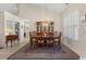 Formal dining room featuring a chandelier and ample seating, perfect for Gathering gatherings at 199 Glenwood Dr., Conway, SC 29526