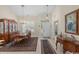 Open dining room with a chandelier, seamlessly connecting to the living room and entryway at 199 Glenwood Dr., Conway, SC 29526