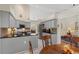 Open concept kitchen featuring sleek countertops, stainless steel appliances, and adjacent dining area at 199 Glenwood Dr., Conway, SC 29526