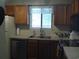 Kitchen with stainless steel dishwasher, wood cabinets and countertops at 207 Indian Wells Ct. # 207, Murrells Inlet, SC 29576