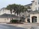 Inviting condo exterior features lush landscaping and covered entrance at 2180 Waterview Dr. # 421, North Myrtle Beach, SC 29582