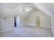 Spacious bedroom with carpet, a pitched ceiling, ceiling fan and a hallway entrance at 221 Hagley Dr., Pawleys Island, SC 29585