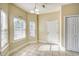 Bright breakfast nook featuring tile floors, multiple windows, natural light, and a 'welcome' sign at 221 Hagley Dr., Pawleys Island, SC 29585