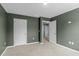 Bedroom featuring carpeted floors, light green walls and 2 closets at 224 Pine Forest Dr., Conway, SC 29526