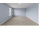 Empty bedroom with neutral carpet and pale blue walls at 224 Pine Forest Dr., Conway, SC 29526