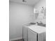 Bright laundry room featuring modern, white, front-loading washer and dryer set at 224 Pine Forest Dr., Conway, SC 29526