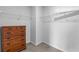 Walk-in closet featuring adjustable wire shelving, a dresser, and carpeted flooring for optimal storage at 224 Pine Forest Dr., Conway, SC 29526