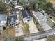 Aerial view of a cozy neighborhood featuring well-maintained houses and manicured yards, near a baseball field at 300 Oak Lake Circle, North Myrtle Beach, SC 29582