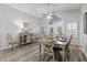 Well-lit dining area featuring a stylish table, elegant chairs, and modern decor at 300 Oak Lake Circle, North Myrtle Beach, SC 29582