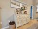 Dining area with beach themed decor on a rustic white console table at 301 Myrtlewood Ct. # 17-E, Myrtle Beach, SC 29572