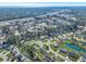 An aerial shot captures a community featuring ponds, green spaces, and suburban homes at 308 Stone Throw Dr., Murrells Inlet, SC 29576