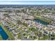 Aerial view of a residential area featuring lush green lawns and serene ponds at 308 Stone Throw Dr., Murrells Inlet, SC 29576