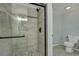 Tiled shower with glass door and rainfall shower head, plus a modern toilet at 308 Stone Throw Dr., Murrells Inlet, SC 29576