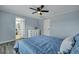 Comfortable bedroom featuring a ceiling fan and an ensuite bathroom at 308 Stone Throw Dr., Murrells Inlet, SC 29576