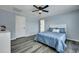 Inviting bedroom featuring a ceiling fan and bright windows at 308 Stone Throw Dr., Murrells Inlet, SC 29576