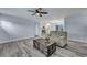 Inviting living room with sleek flooring and a view into the kitchen, promoting an open layout at 308 Stone Throw Dr., Murrells Inlet, SC 29576