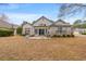 Spacious backyard with a patio, ideal for summer barbecues and outdoor enjoyment at 3103 Robyn Ct., Little River, SC 29566