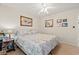 Bedroom with a ceiling fan, a large bed, and natural light from the window at 3103 Robyn Ct., Little River, SC 29566