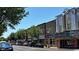 Street view showcasing buildings with shops and offices in a downtown setting with vehicular traffic at 3127 Tiger Tail Rd., Conway, SC 29526