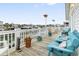 Spacious back porch offering comfortable seating and scenic views of the surrounding neighborhood at 315 60Th Ave. N, North Myrtle Beach, SC 29582