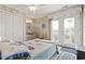 Bedroom featuring sliding door with a view of the outdoor balcony at 315 60Th Ave. N, North Myrtle Beach, SC 29582