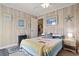 Bedroom featuring wood paneled walls, nautical themed decor, and double door at 315 60Th Ave. N, North Myrtle Beach, SC 29582