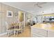 Cozy dining area conveniently located near the kitchen and living room, ideal for meals and relaxation at 315 60Th Ave. N, North Myrtle Beach, SC 29582