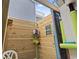 Outdoor shower featuring wood walls and a shelf for storing shower accessories at 315 60Th Ave. N, North Myrtle Beach, SC 29582