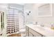 Bathroom featuring a shower with gray and white striped curtain, a toilet, and a vanity at 321 Rycola Circle, Surfside Beach, SC 29575