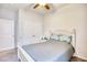 Bedroom showcasing carpet, a ceiling fan, and a bed with decorative pillows and white headboard at 321 Rycola Circle, Surfside Beach, SC 29575