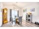 Cozy dining area with a grandfather clock, gray chairs, and elegant décor at 321 Rycola Circle, Surfside Beach, SC 29575