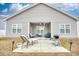 Charming home's exterior with a covered patio, perfect for outdoor relaxation and entertaining at 321 Rycola Circle, Surfside Beach, SC 29575