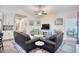 Cozy living room with modern furnishings, light walls, and luxury vinyl plank flooring at 321 Rycola Circle, Surfside Beach, SC 29575