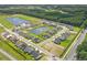 Aerial view of new construction community with ponds and green spaces at 3316 Little Bay Dr., Conway, SC 29526