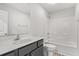 Bright bathroom featuring a shower-tub combo, modern vanity, and neutral finishes at 3332 Little Bay Dr., Conway, SC 29526