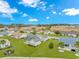 Aerial shot of homes in a landscaped community under a beautiful blue sky at 401 Oak Crest Circle, Longs, SC 29568