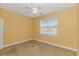 Bedroom with neutral walls, carpet and a window providing natural light at 401 Oak Crest Circle, Longs, SC 29568