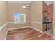 Cozy dining room with hardwood floors, natural light, and convenient access to the kitchen at 401 Oak Crest Circle, Longs, SC 29568