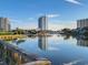 Scenic water view featuring modern buildings reflecting in the calm water on a sunny day at 410 Melrose Pl. # 304, Myrtle Beach, SC 29572