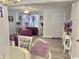 Open living space with gray floors, purple accents, and ample natural light at 415 28Th Ave. N # 4-A, Myrtle Beach, SC 29577